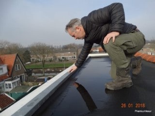 inspecteren van een plat dak