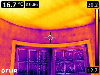 Infrared thermal image of a window showing cold, damp edges where condensation forms